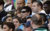 Na snímke uprostred argentínska futbalová legenda Diego Maradona. (Zdroj: TASR/AP)